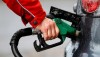 An attendant refuels a car at a petrol station in Rome January 4, 2012. Italians were hit with an increase in petrol prices last month, a first tangible sign of Prime Minister Mario Monti's 30-billion euro ($40.1 billion) austerity package.   REUTERS/Max Rossi  (ITALY - Tags: BUSINESS)